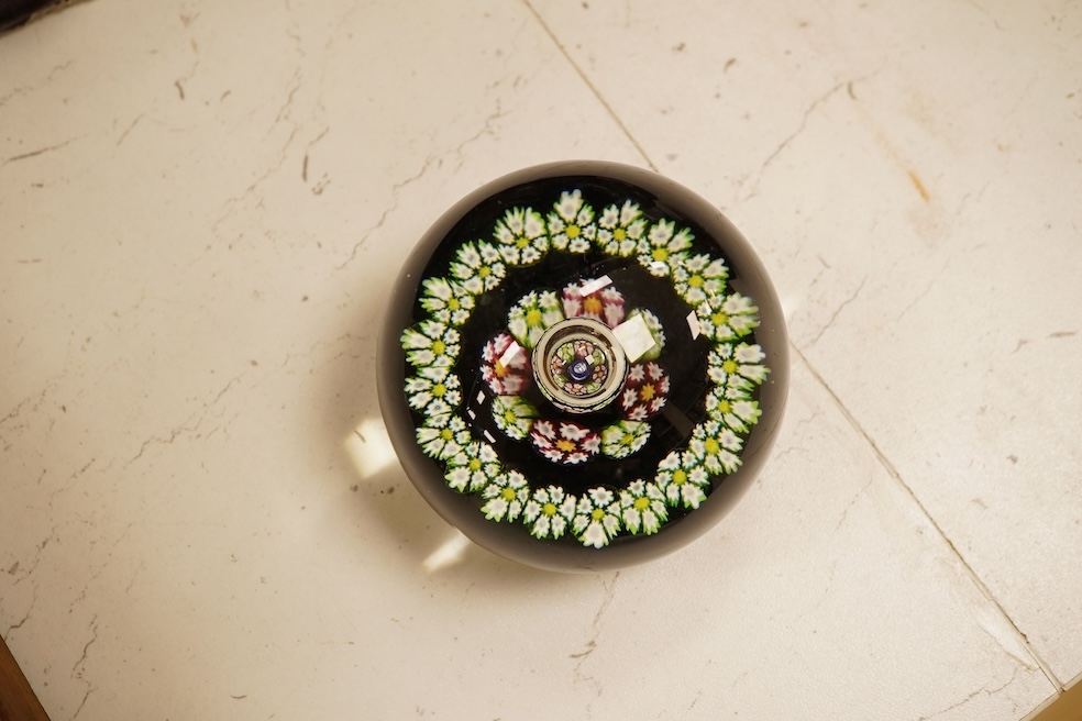 Four Caithness boxed paperweights to include ‘Garland’ and boxed Langham paperweight
